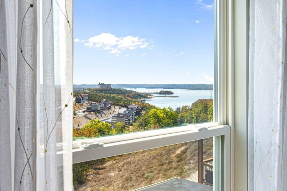 Wake up from the plush king bed to enjoy a stunning view of the lake