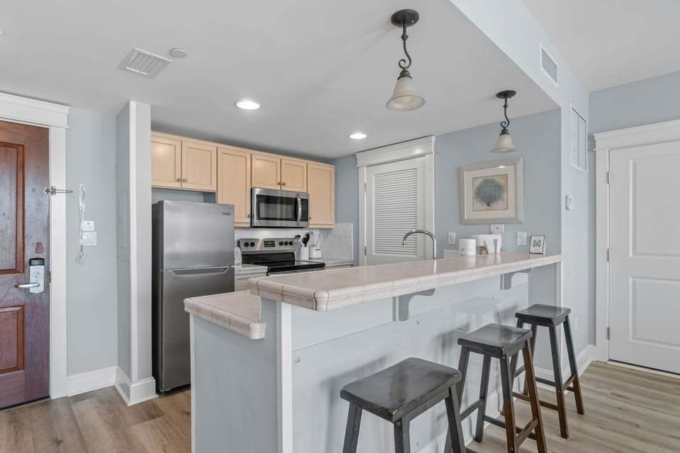 Kitchen area with bar seating