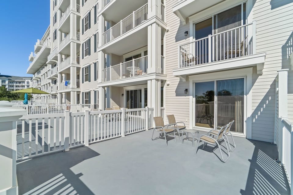 Spacious balcony with seating and scenic views