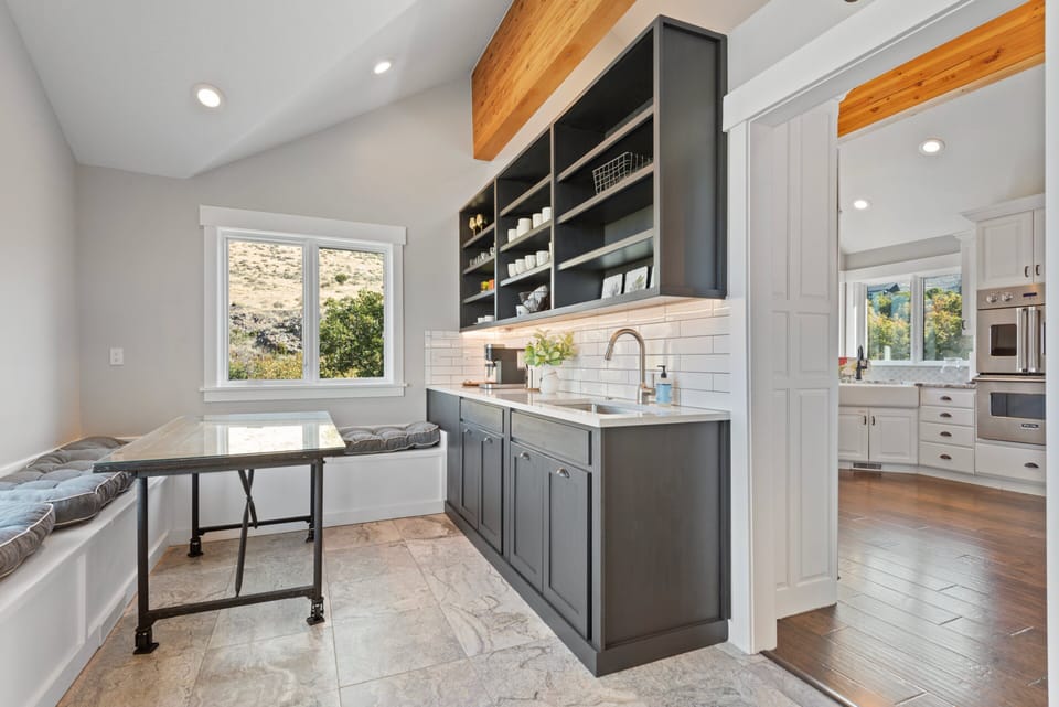 An amazing breakfast nook and coffee bar with incredible views of the new Deer Valley expansion