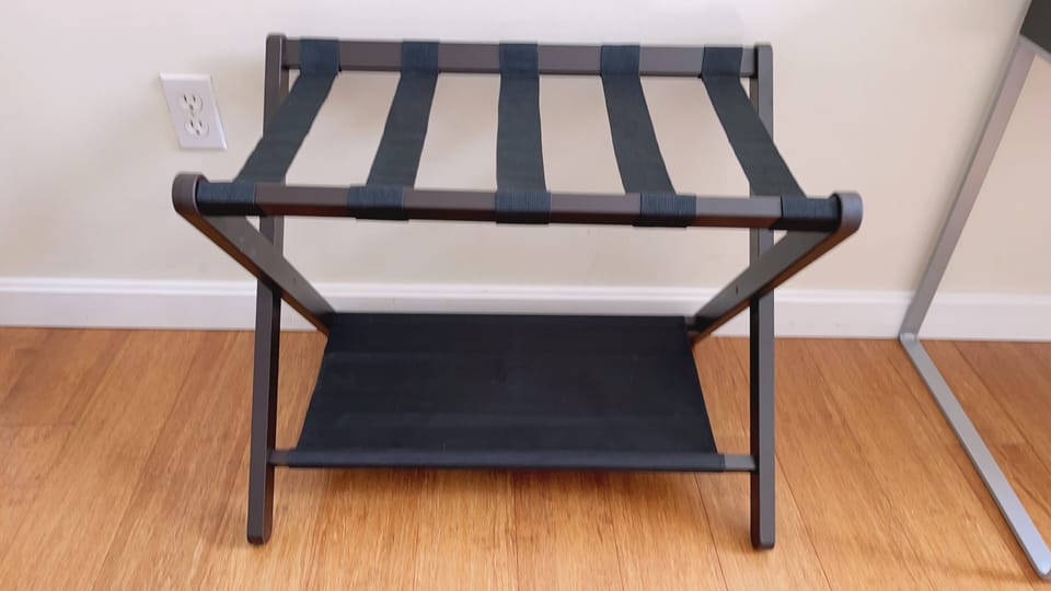 Two luggage racks in two bedrooms