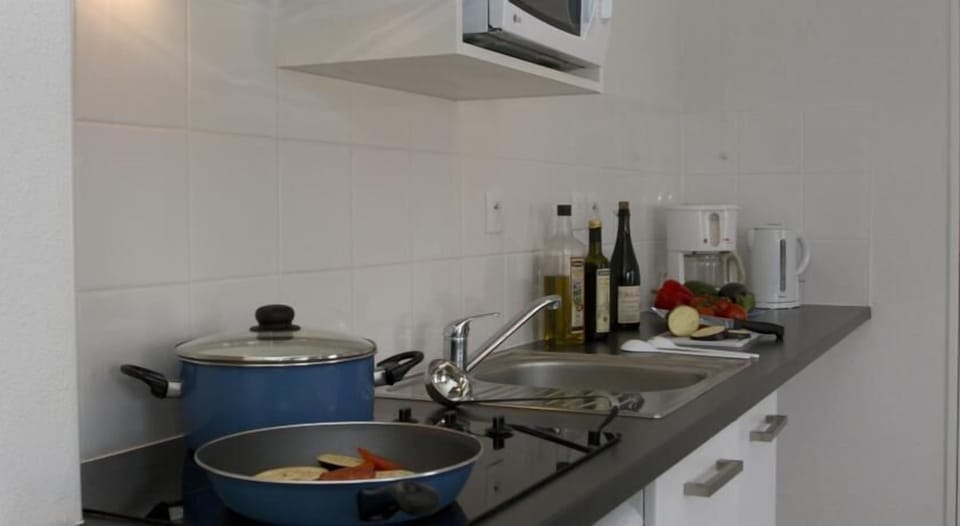 Whip up a quick bite to eat in the kitchen.
