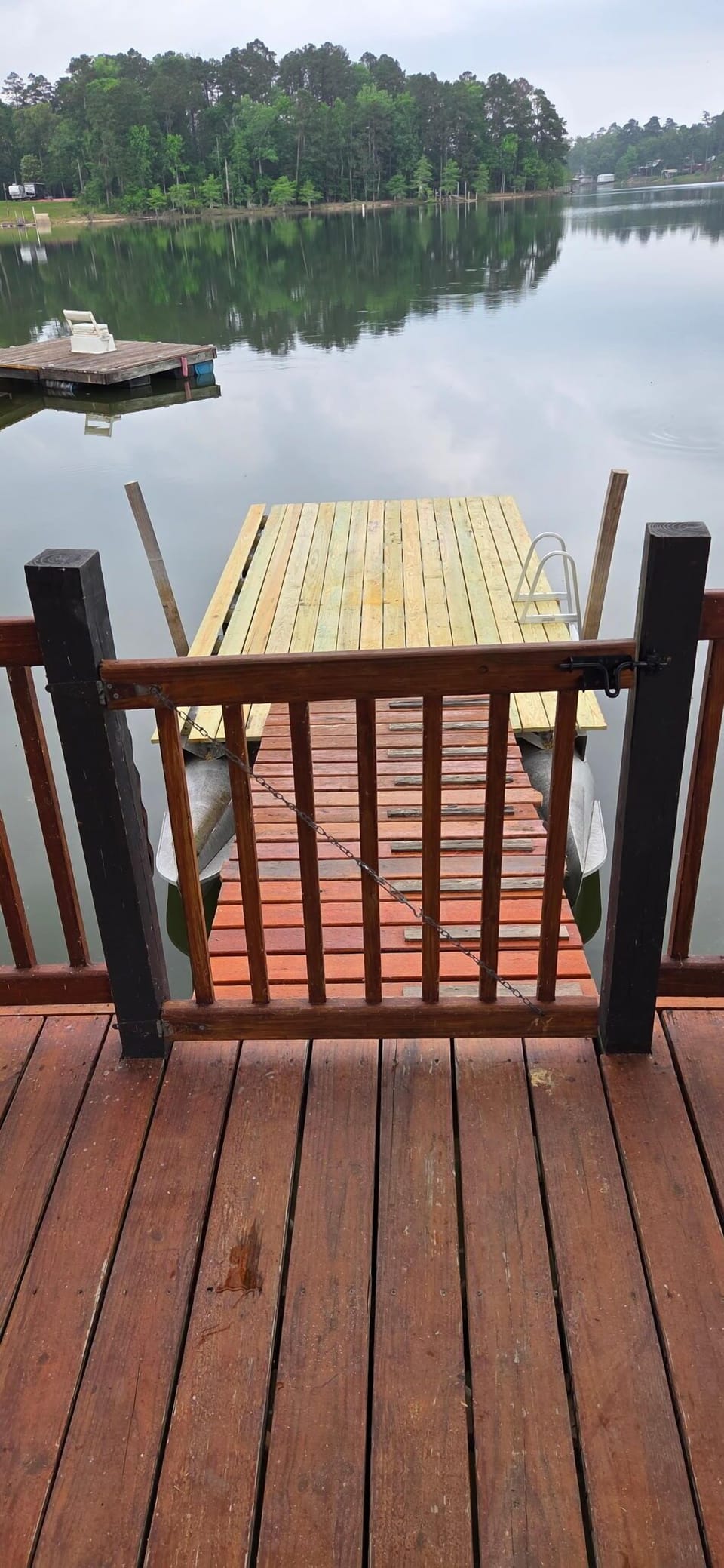 Floating platform at the end of the dock with ladder for swimming space, summer, outdoor, body of water, dock, daytime