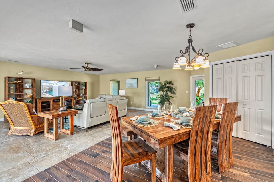 You enjoy meals at the dining table while the living room stretches invitingly nearby, keeping everyone connected and comfortable.