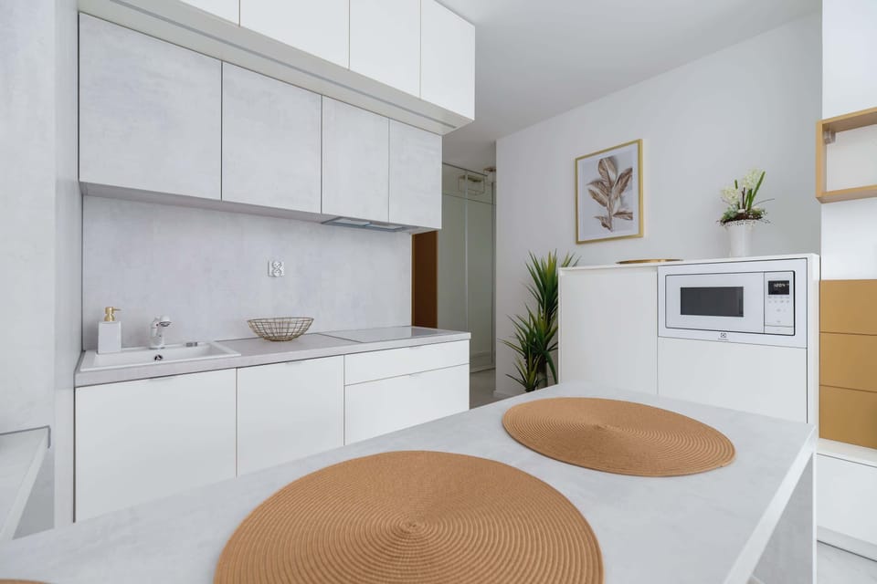 Kitchenette with a kettle.