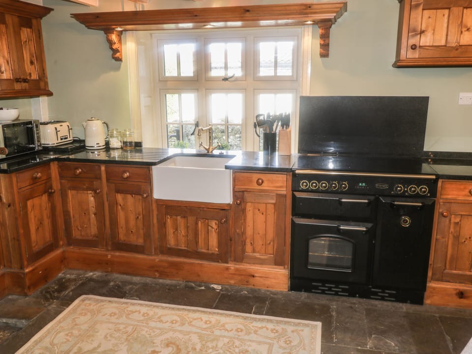 Fridge, electric kettle, toaster, cookware/dishes/utensils