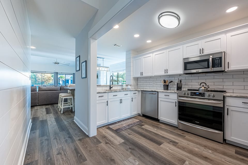 Kitchen Opens to Living and Dining Area