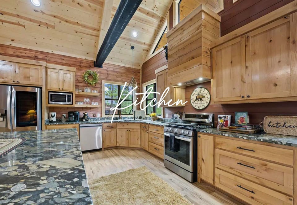 Cook up memories in this cabin's charming kitchen! Modern amenities meet rustic charm.