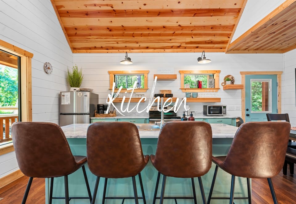 Chic and charming, our kitchen is a foodie's dream. Whether it's a quick snack or a full-course meal, cooking here is a pleasure