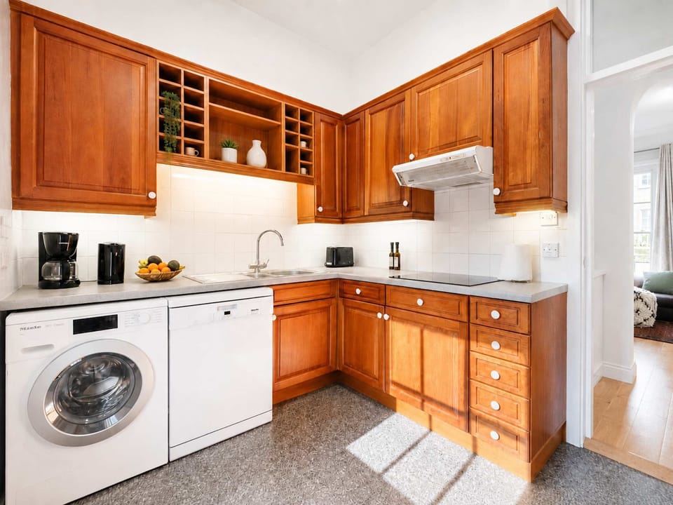 The kitchen is fully equipped to prepare a simple meal 