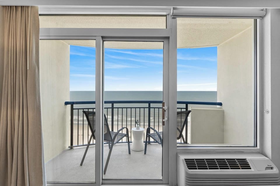 Relax and unwind with panoramic ocean views from your private balcony.