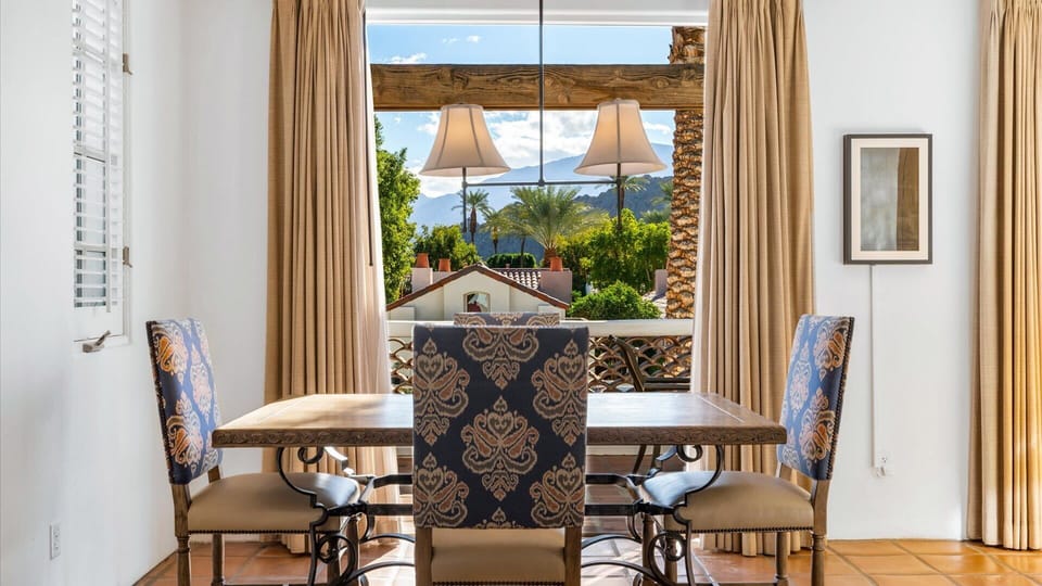 Dining Area w/ Opening to Private Balcony
