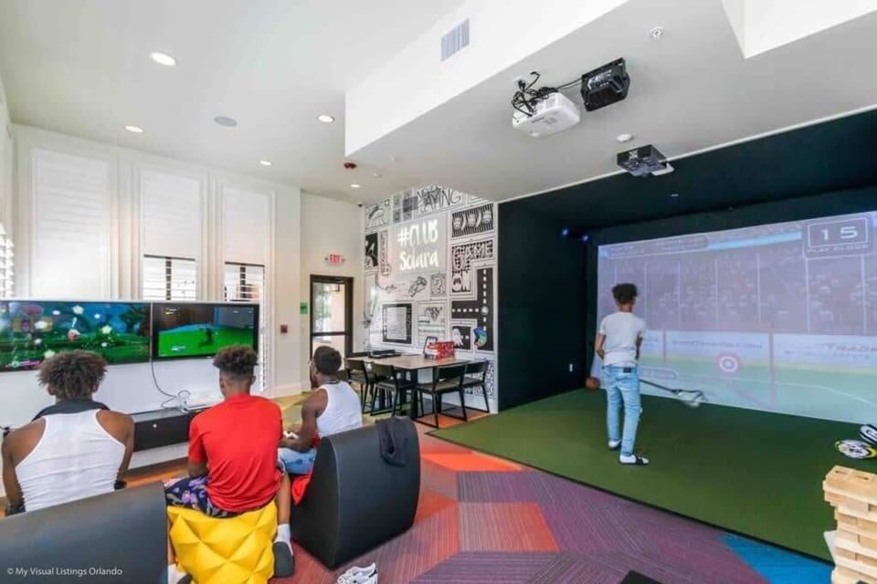 - Community game lounge with sports simulator and seating
- Resort style clubhouse fun for kids teens and adults
- Shared amenities space for entertainment and group time