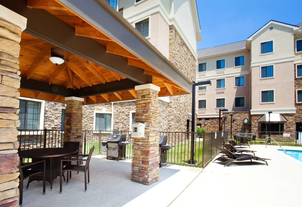 Gather under the charming gazebo, complete with BBQ grills for delicious outdoor meals.