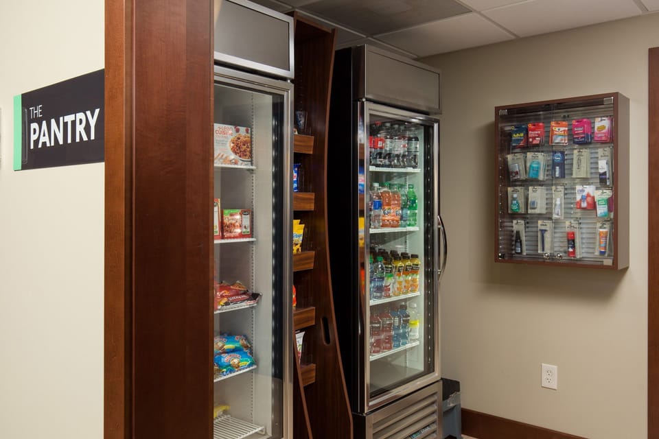 On-site pantry stocked with snacks, drinks, and convenience items.