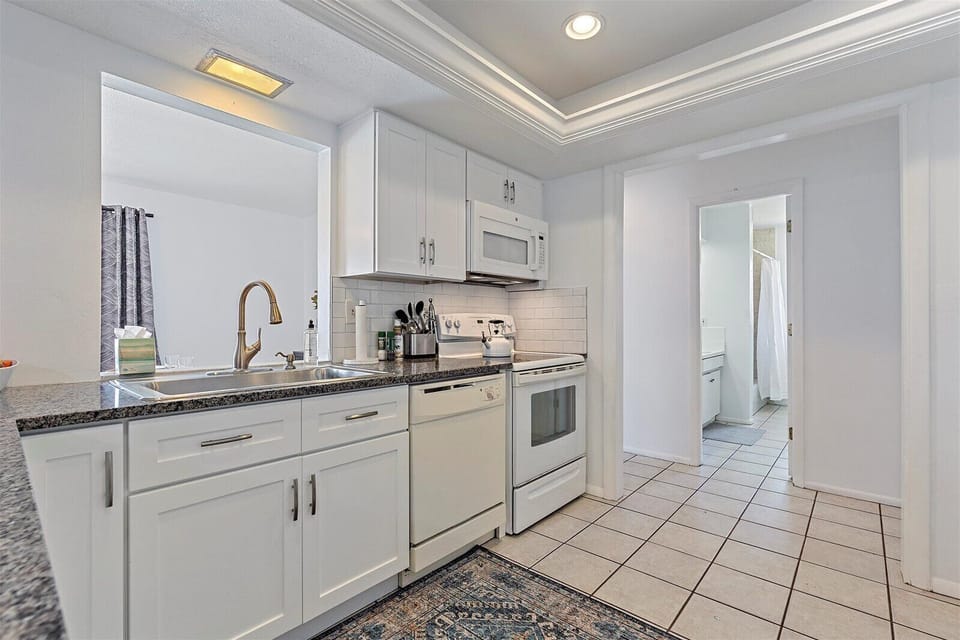 Large kitchen equipped with everything you'll need to cook your favorite meals. (Food is not provided.)