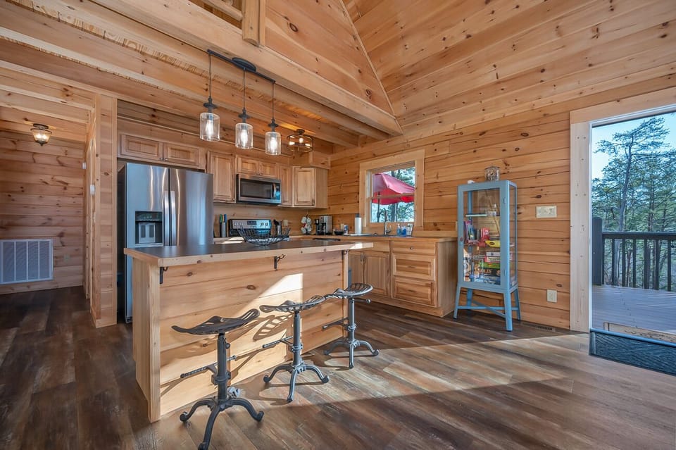 Access to Back Deck is through Kitchen / Dining Area