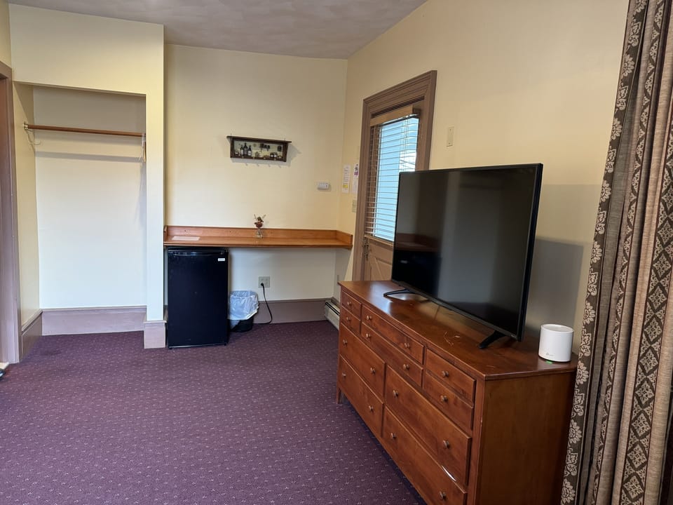 Guest room #2 clothing storage and mini fridge
