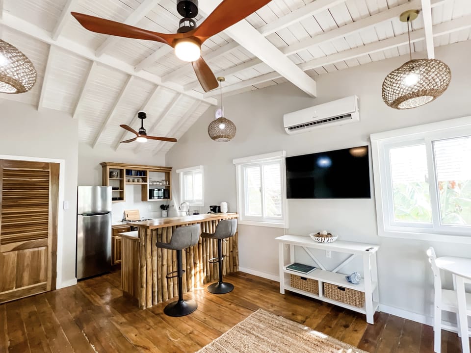 View of the kitchen and upstairs from the living room. 