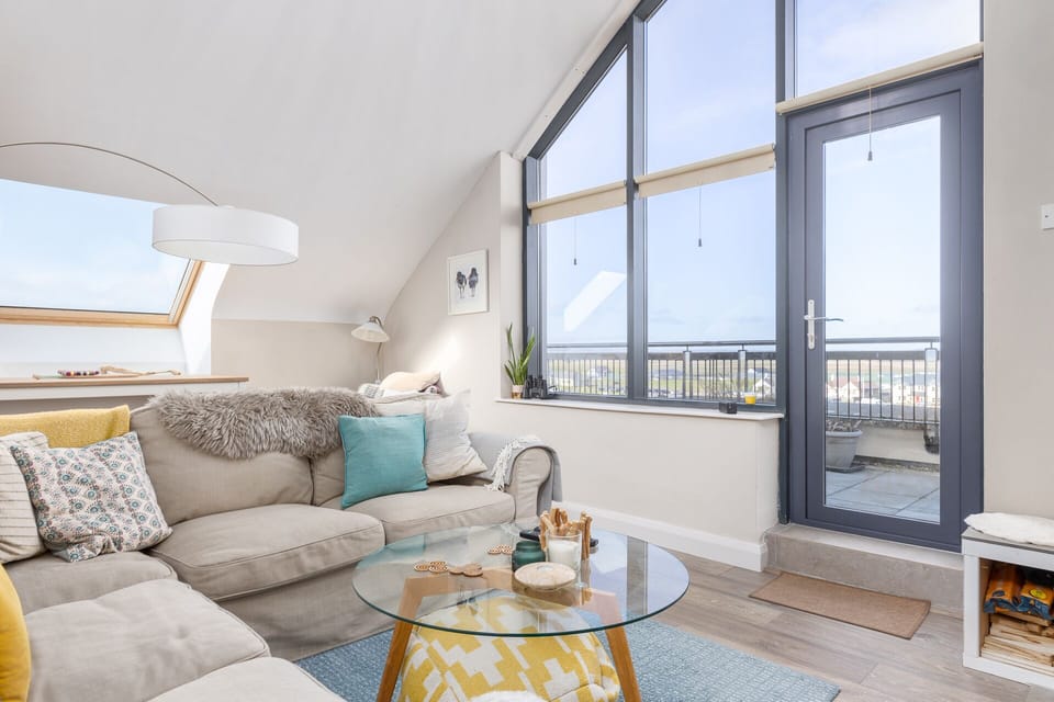 Living room of The Dell 18 overlooking Lahinch Golf Club