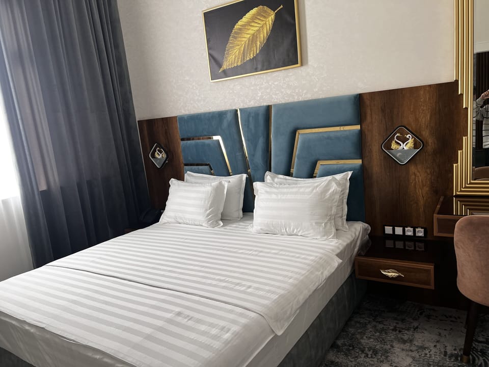 Premium Double Room | Minibar, in-room safe, desk, blackout drapes