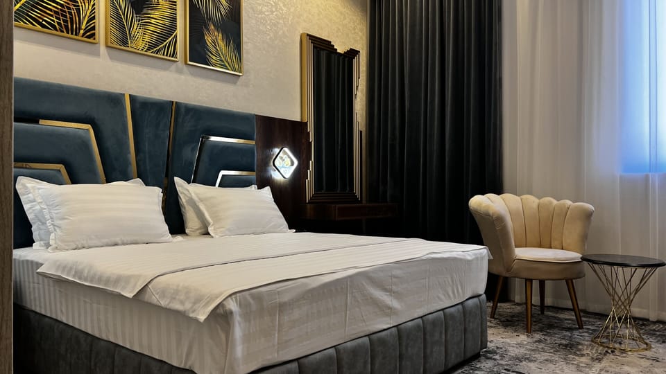 Deluxe Double Room, 1 King Bed | Minibar, in-room safe, desk, blackout drapes