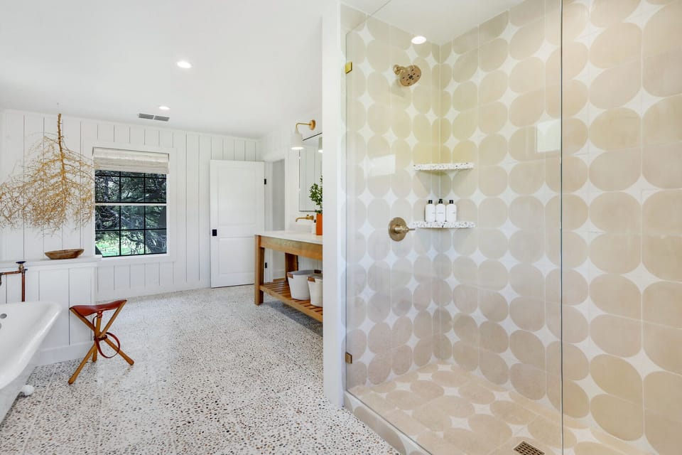 Bathroom 1 has a walk-in shower.