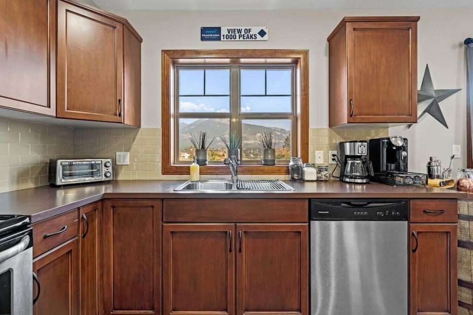 Full kitchen with a blender, kettle, air fryer, griddle, crockpot, drip coffee machine, ground coffee, tea, sugar and basic condiments (ketchup, mustard and relish.)