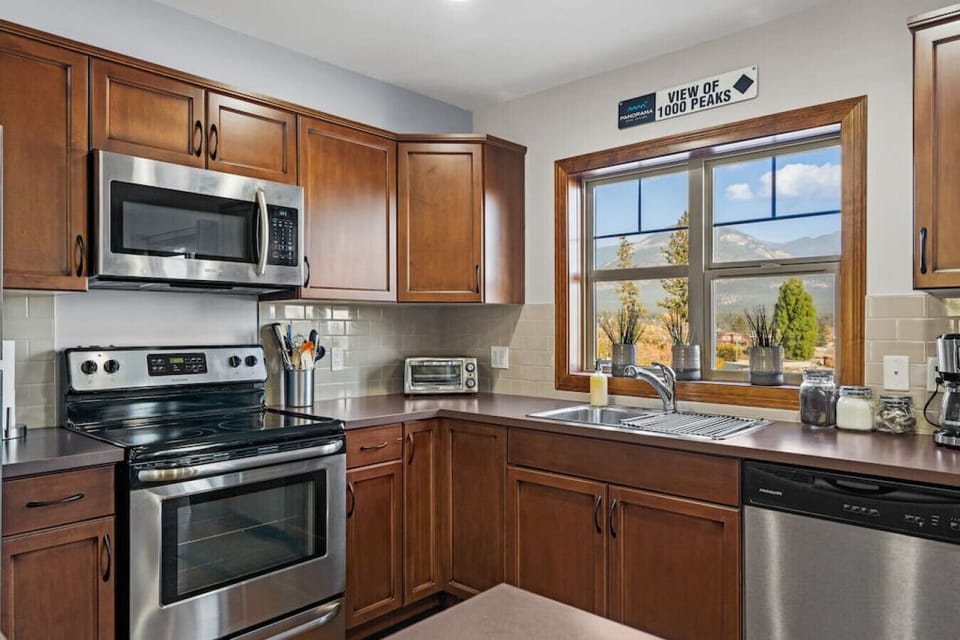 Full kitchen with a blender, kettle, air fryer, griddle, crockpot, drip coffee machine, ground coffee, tea, sugar and basic condiments (ketchup, mustard and relish.)