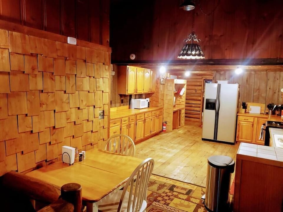 Well equipped and large kitchen with eat in table.