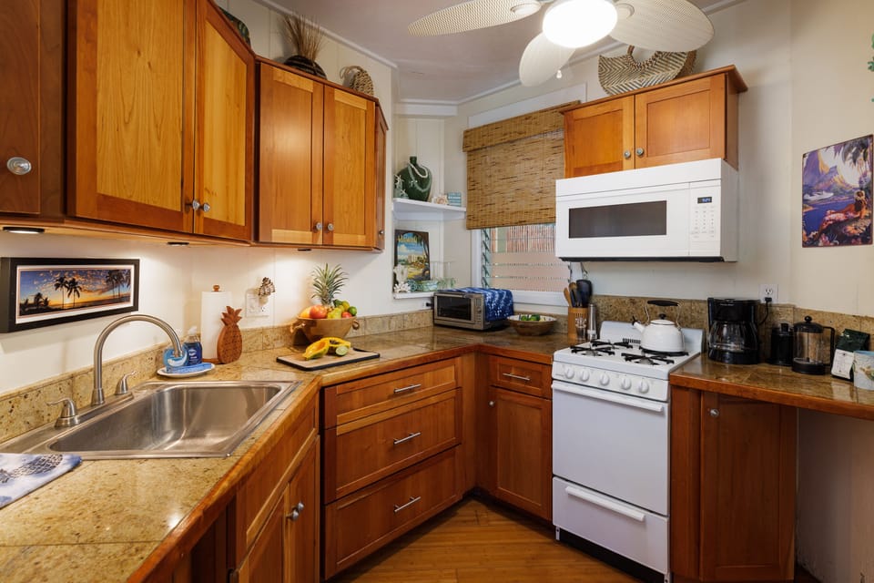 Kitchen has full size refrigerator