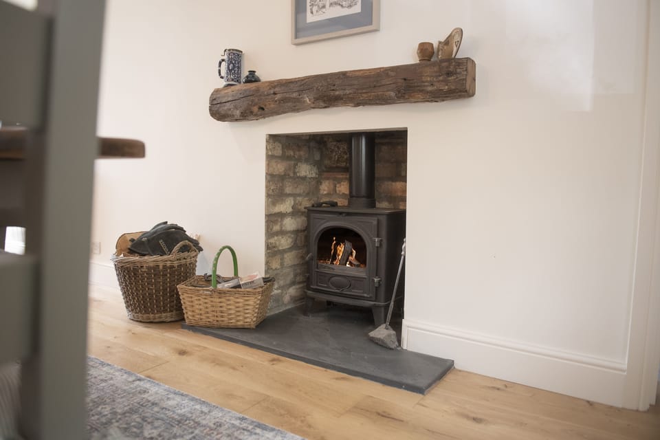 Ground floor: Dining area with wood burning stove