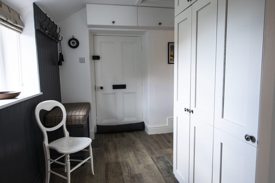 Ground floor: Boot room leading to the utility area
