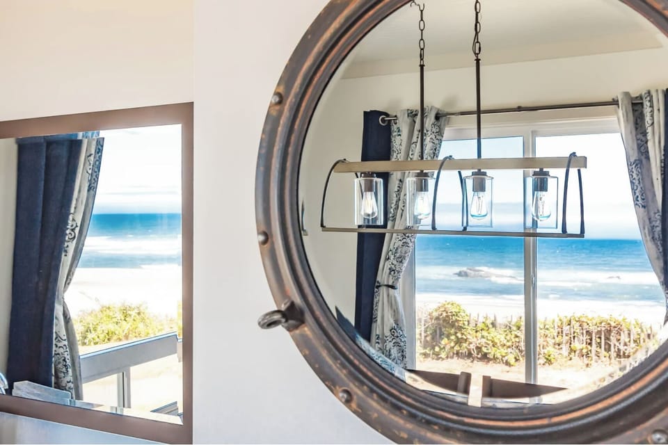 Refection in the mirror of the ocean scene from the dining room table.