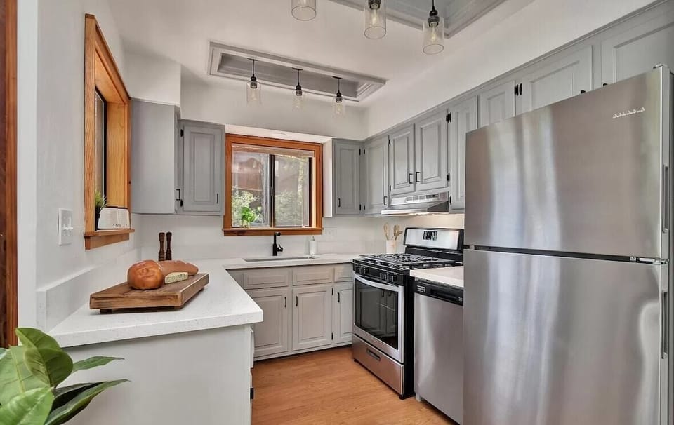 Fully stocked kitchen includes microwave, coffee maker, toaster, electric griddle, pizza oven, crockpot, and so much more