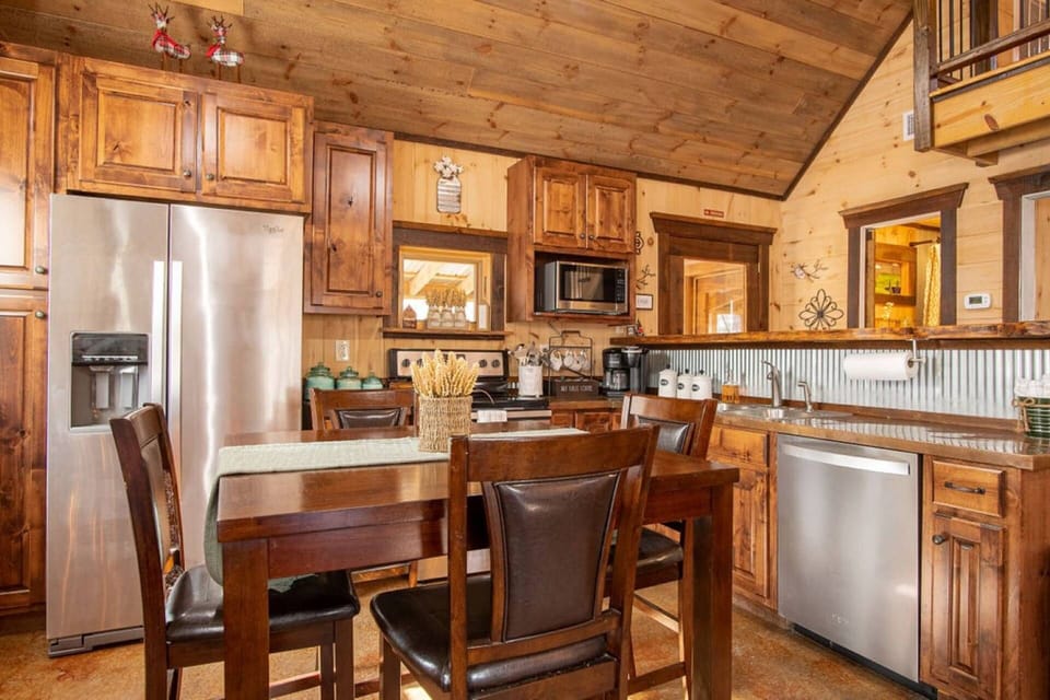 Fully stocked kitchen with a stove, oven, refrigerator, dishwasher, and other appliances to make meals a breeze