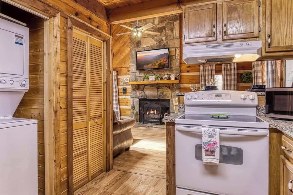  Whip up meals in style with a cozy fireplace and mountain views!