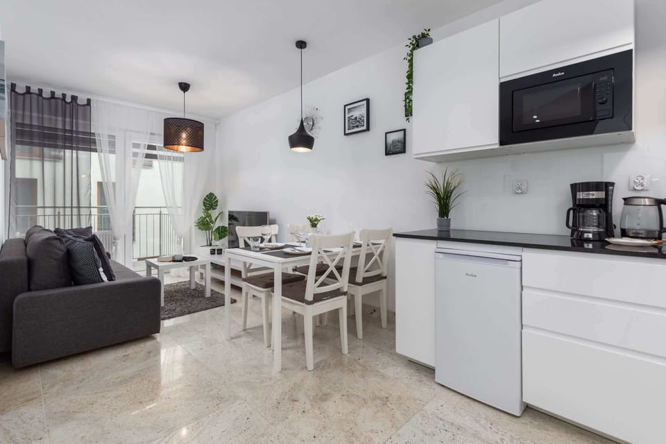 Living room with dining table.