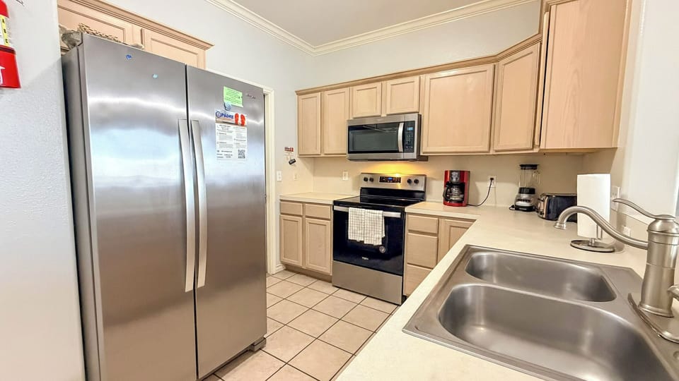 Your fully equipped kitchen features stainless steel appliances and everything you need to prepare delicious meals during your stay.