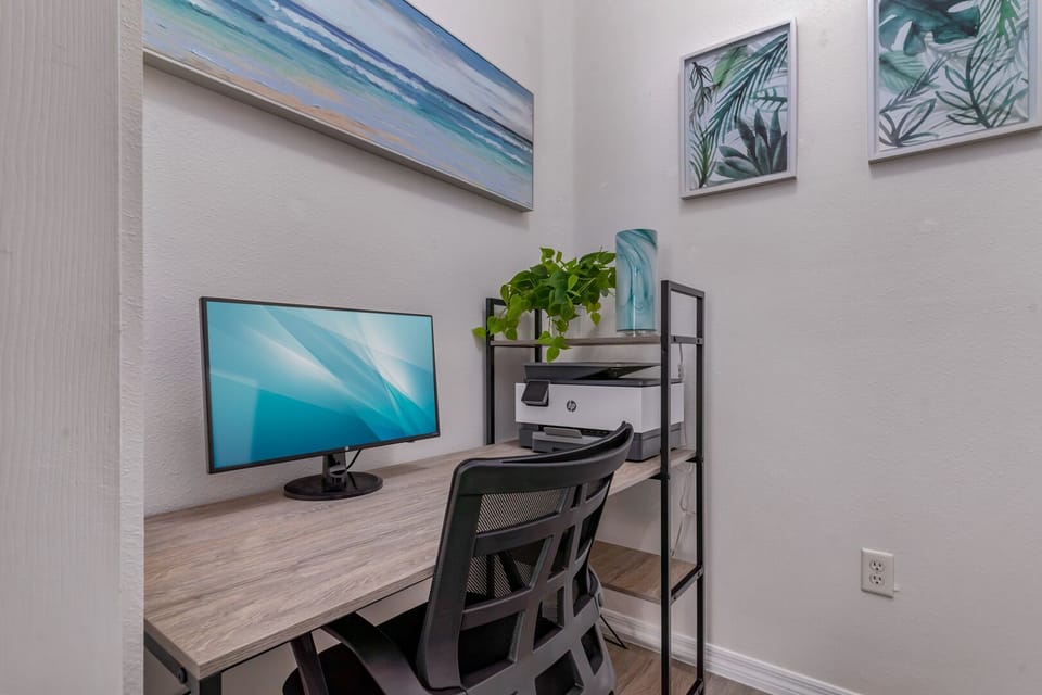 Extra monitor and printer set up for your convenience.