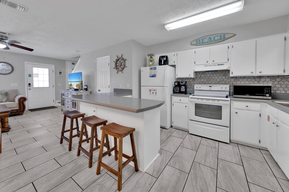 Kitchen with eat-in bar seating