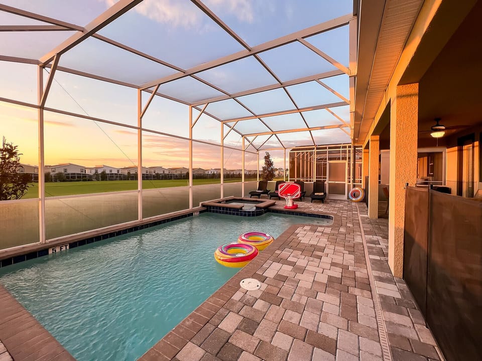 Enjoy beautiful sunsets relaxing by the pool with golf course view (1)