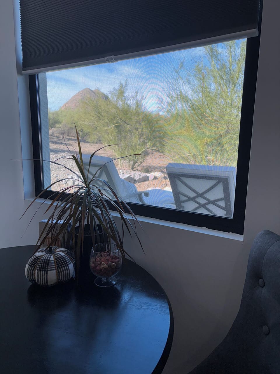 View of Gavilan Peak out the window next to table