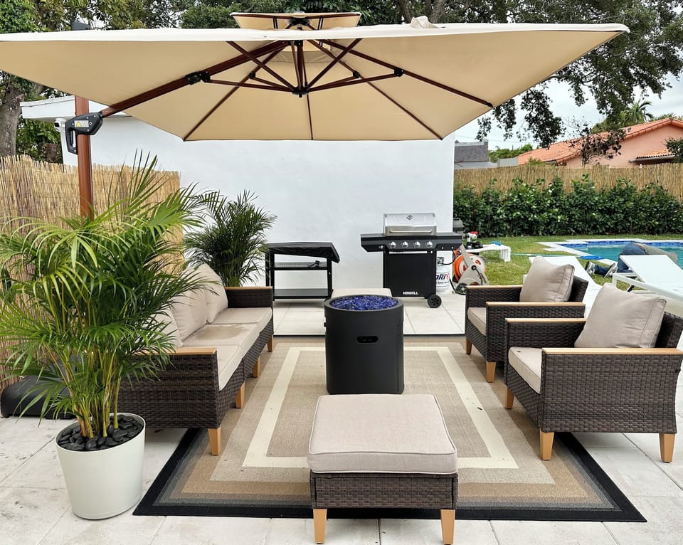 BBQ and FIREPIT area with a 360 umbrella.