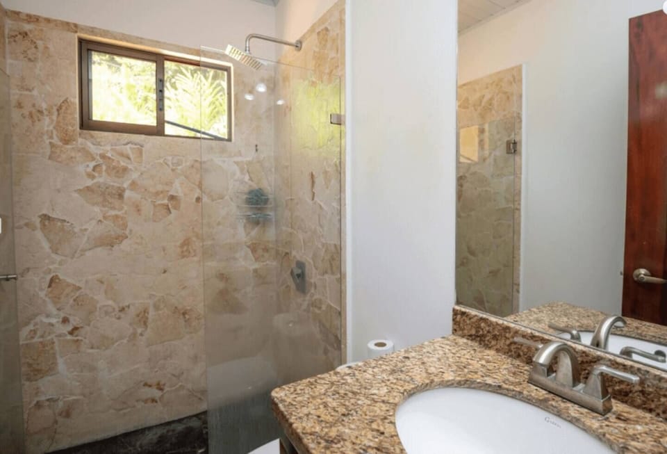 stylish bathroom featuring creative touches and bold, unconventional decor.