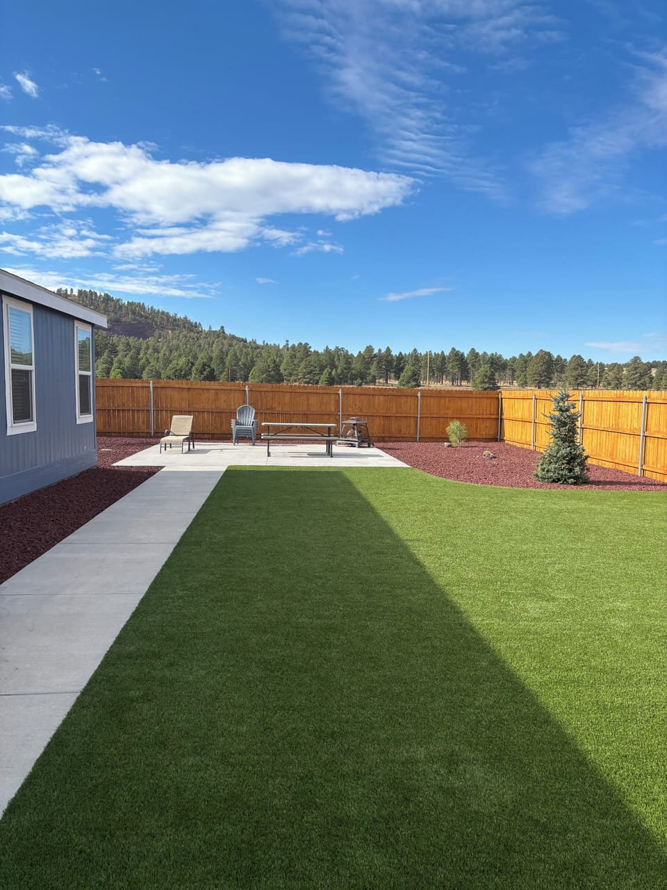 Large turf area with no homes behind