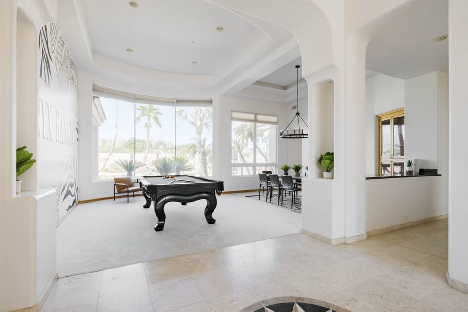 Beautiful luxury pool table room with 20 foot ceilings!