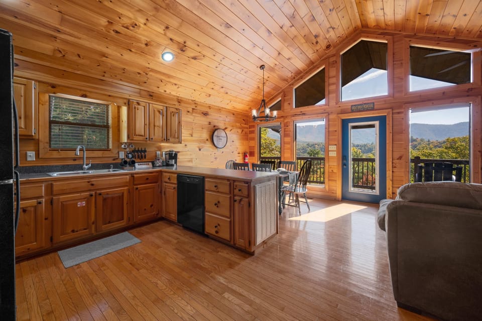 Floor-to-ceiling windows create amazing views from the common areas of this cabin.
