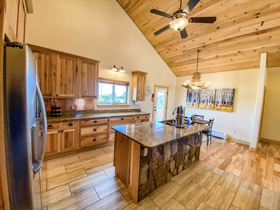 The ample counter space and  new stainless steel appliances of the Kitchen ensures that you have everything you need to whip up a delicious meal