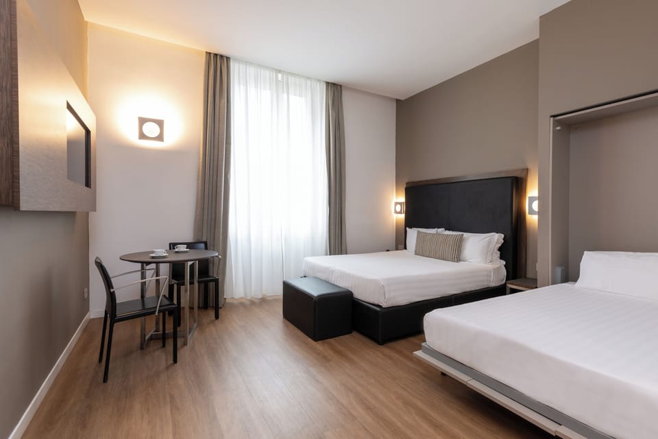 Quadruple Room | Minibar, in-room safe, desk, WiFi (free)